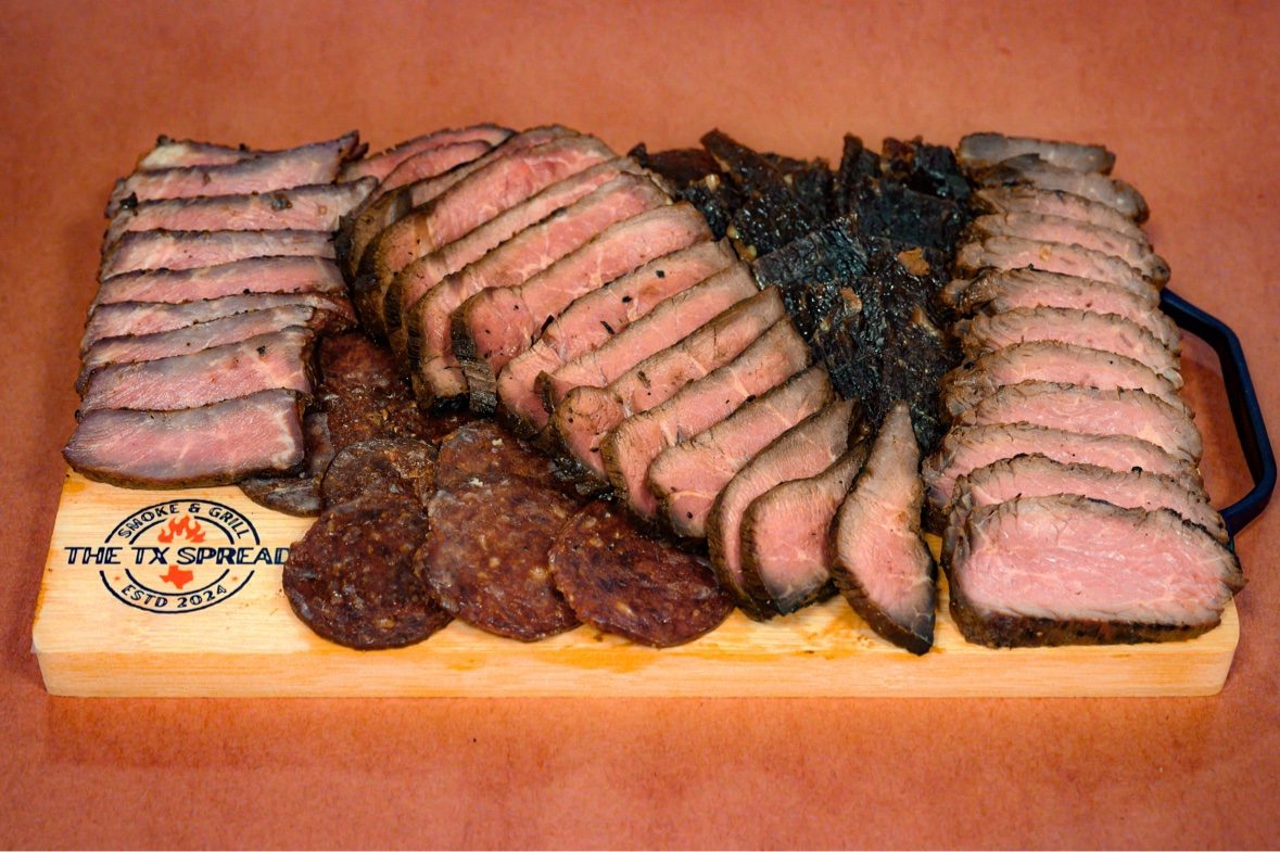 The Starter board — a Tx Spread board with sliced smoked meats and salami
